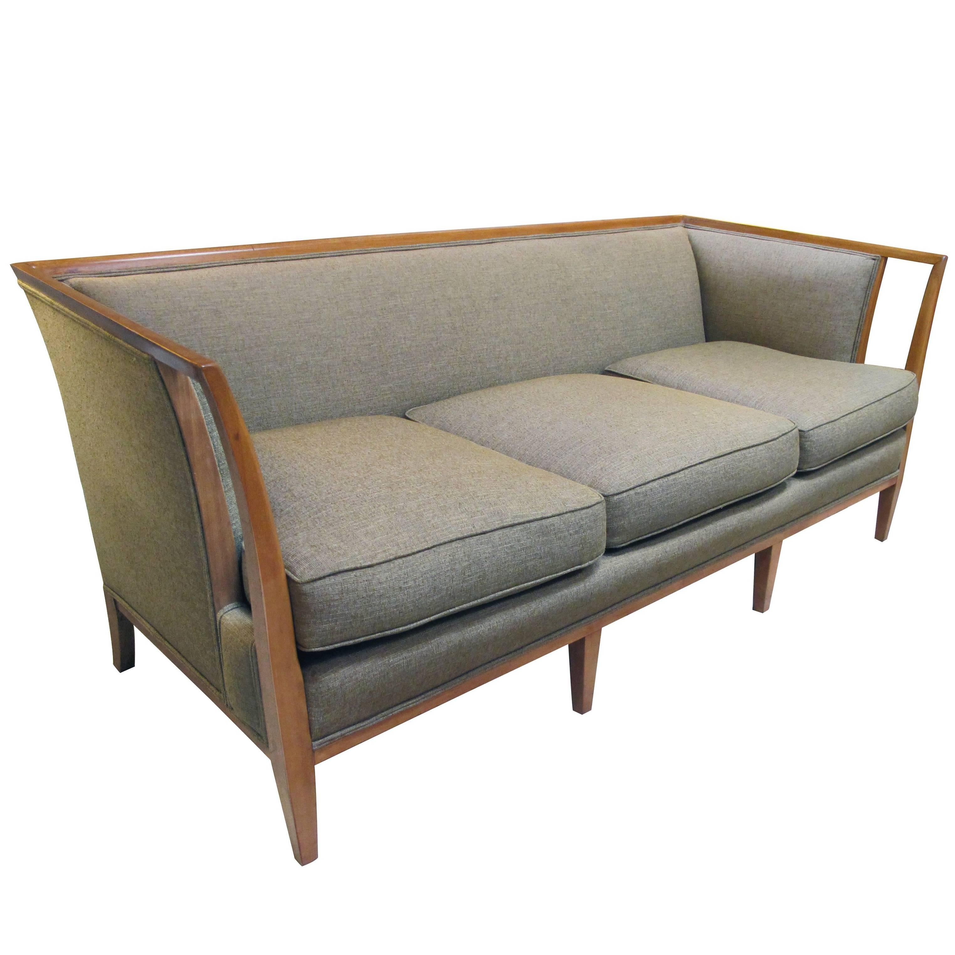 Shapely American T.H. Robsjohn-Gibbings Style Sofa with Flared Openwork Arms For Sale