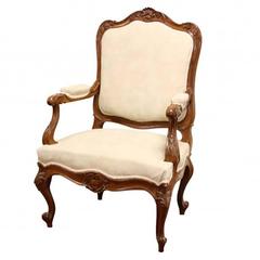 Antique Louis XV Style Carved Walnut Fauteuil in Suede Upholstery