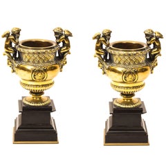 19th Century Pair of French Gilt Bronze Urns with Cherubs