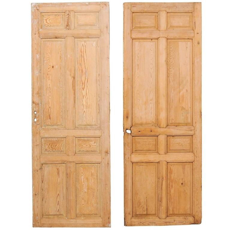 Pair of Single French EightPanel Wood Doors with Natural Wood Finish