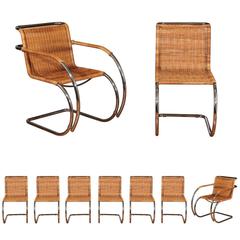 Pristine Set of Eight Italian Wicker Chairs in the Style of Mies van der Rohe