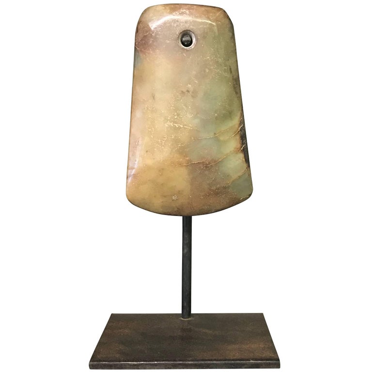 stone ax head sculpture