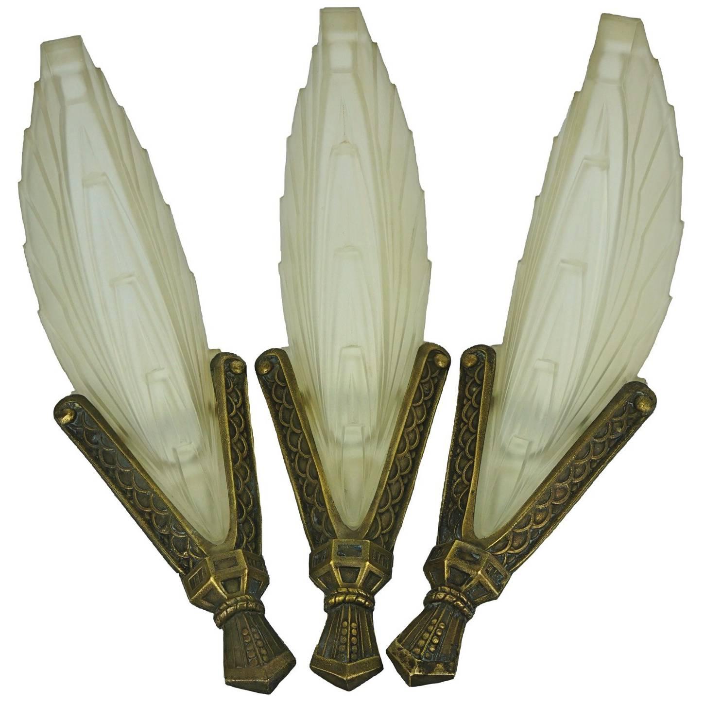 Three Art Deco Wall Sconces with Stylized Flames For Sale