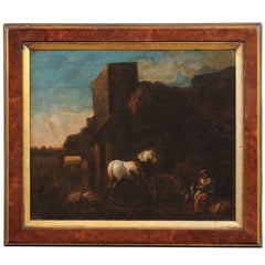 Peinture à l'huile sur toile italienne du 18ème siècle encadrée représentant un cheval dans un paysage