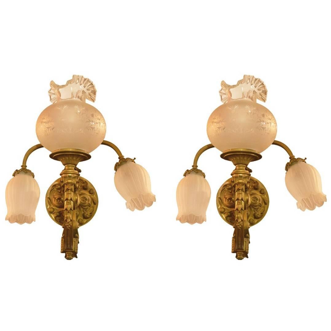 Pair of 19th Century French Gilt Bronze Three-Light Wall Sconces For Sale