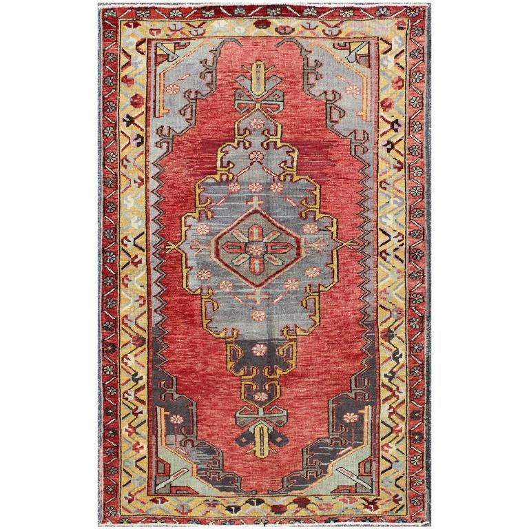 Antique Oushak Rug from Turkey with Central Medallion and Sub-Geometric