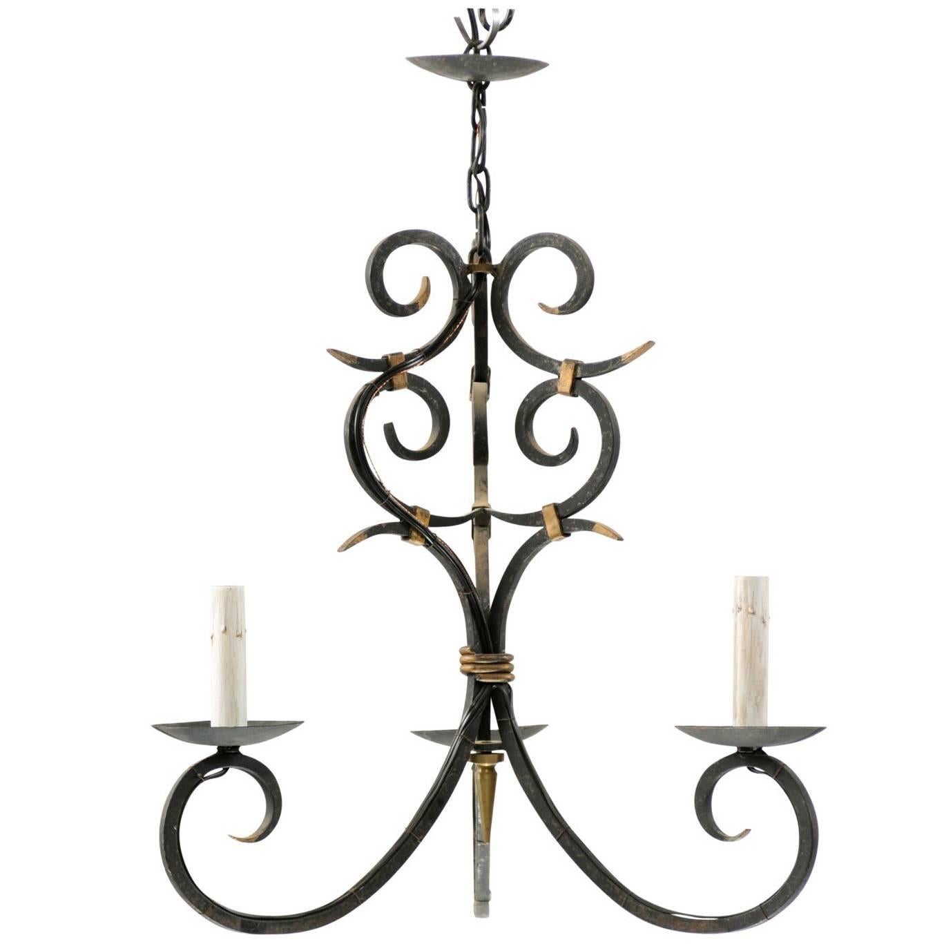 French Forged Iron Three-Light Chandelier with Scrolled Arms and Gilded Accents