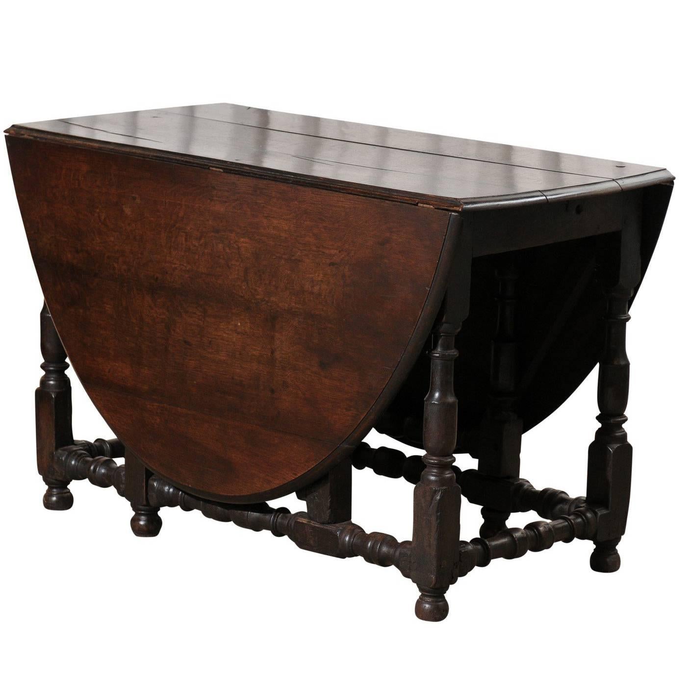 English Oak Oval Gateleg Table, Dark Finish, Good Condition, circa 1860 For Sale