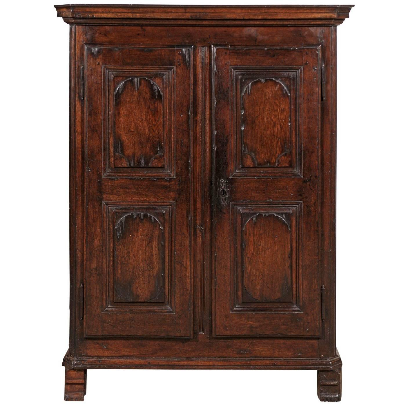 French Armoire in Oak, circa 1800 with Carved Doors and Two Interior Shelves For Sale