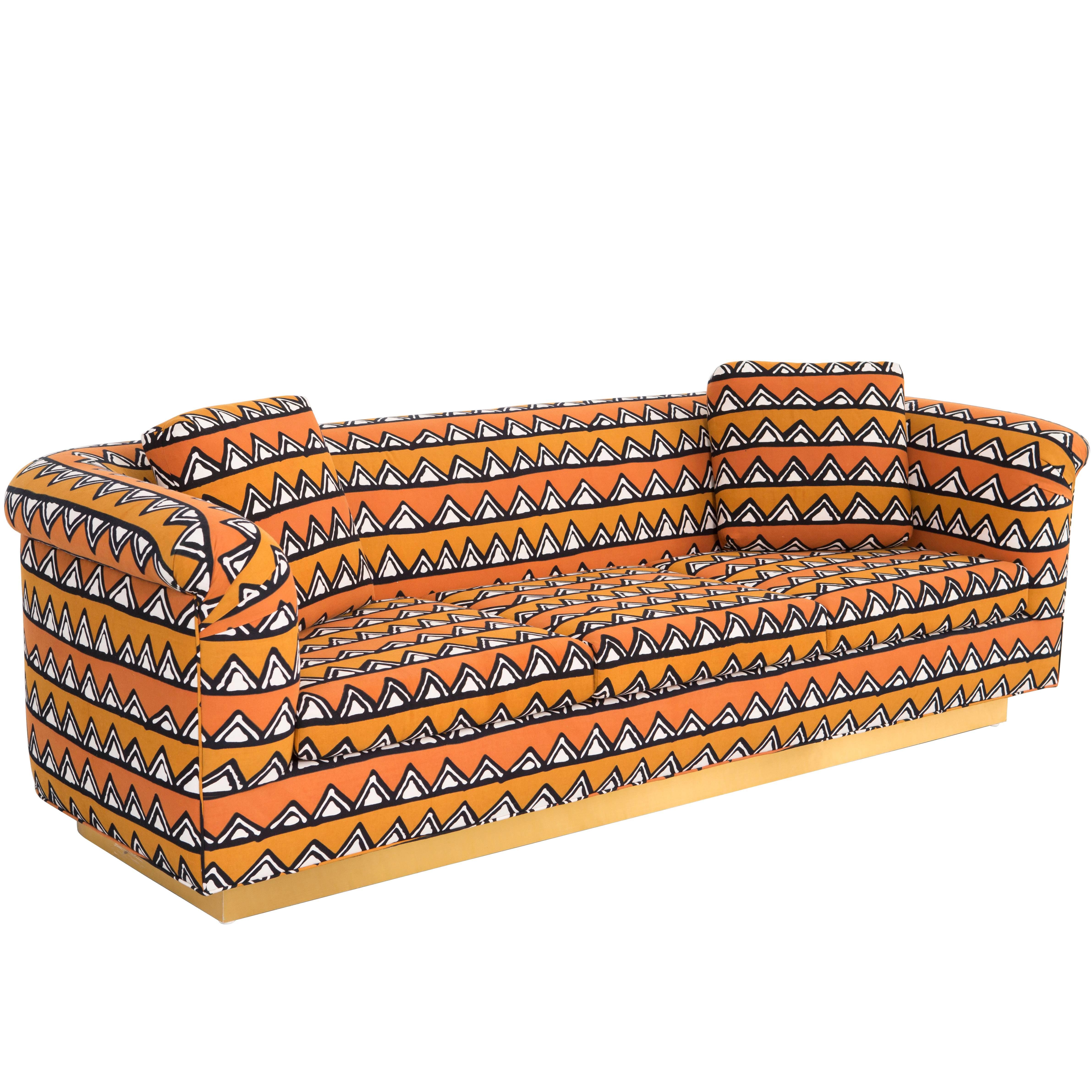  Rounded Barrel Back Brass Platform Sofa Reupholstered in African Mud Cloth  For Sale