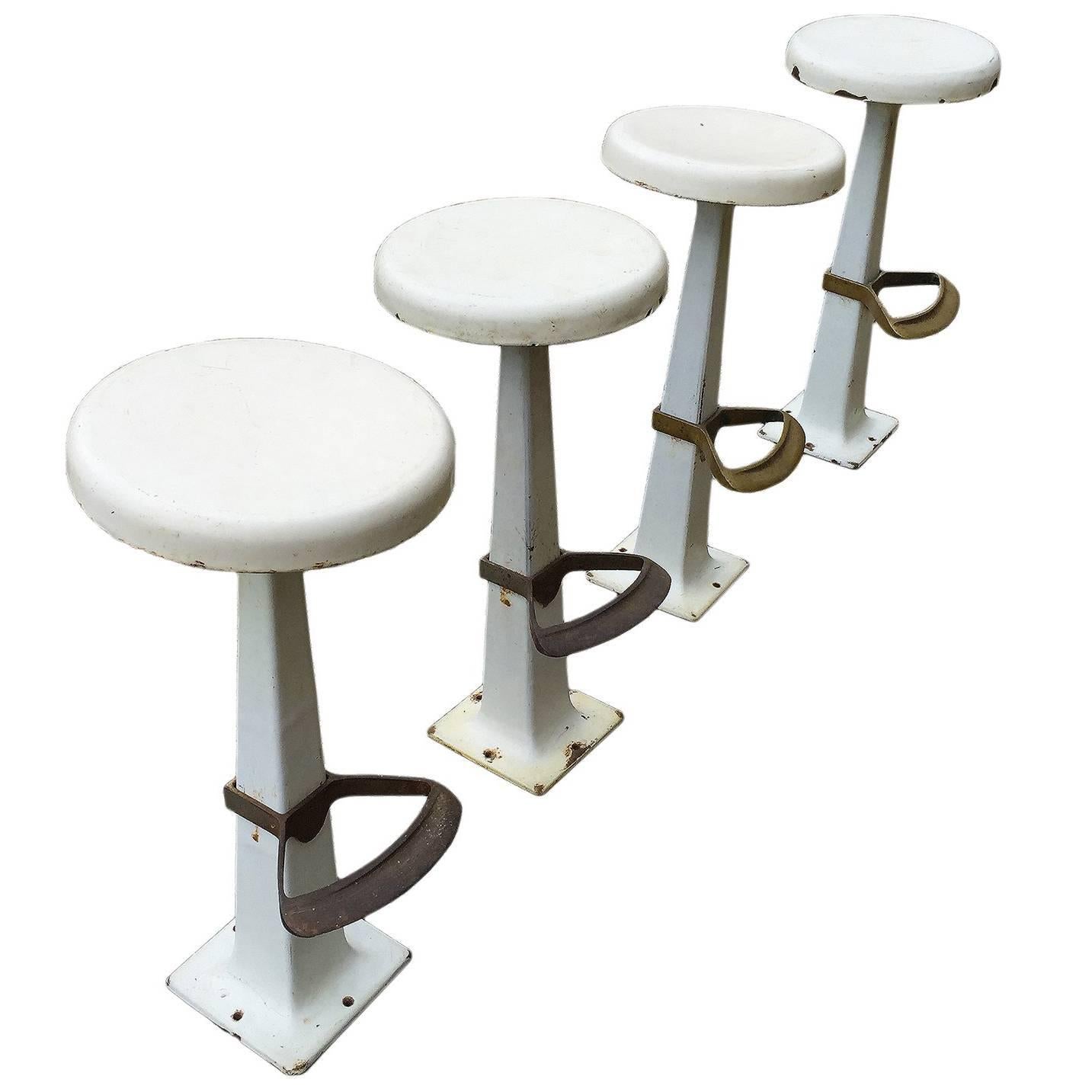 Group of Four Beautiful White Enameled Metal Stools with Footrest, circa 1930