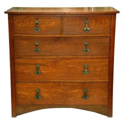 Heals. An Arts and Crafts Oak Chest of Drawers, Stamped Heals of London