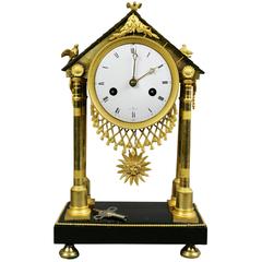 Charles X Ormolu and Patinated Bronze Mantle Clock