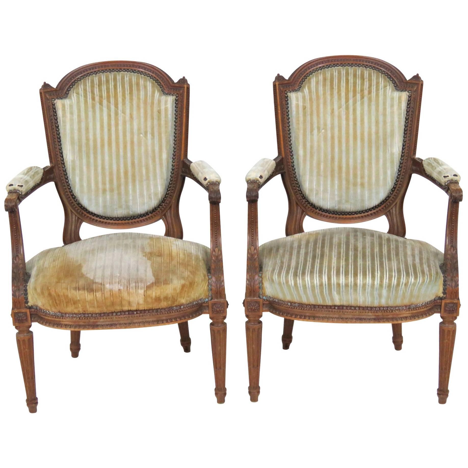 Pair of Antique Louis XVI Style Carved Walnut Fauteuils Arm Chairs For Sale