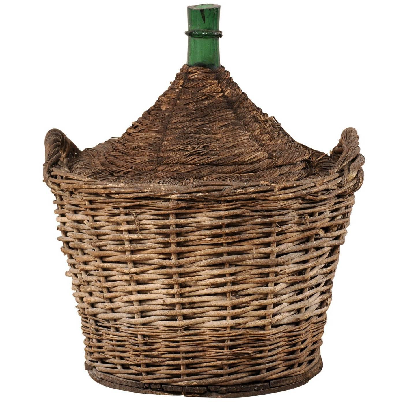 French Mid-Century Handwoven Basket with a Large Demijohn Glass Wine Bottle