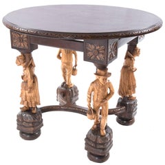 Table de Gueridon française du 19e siècle à pieds sculptés et figuratifs