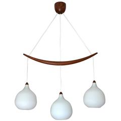 Sculptural Teak 
Opal Glass Chandelier by Uno 
Osten Kristiansson Luxus, 1956