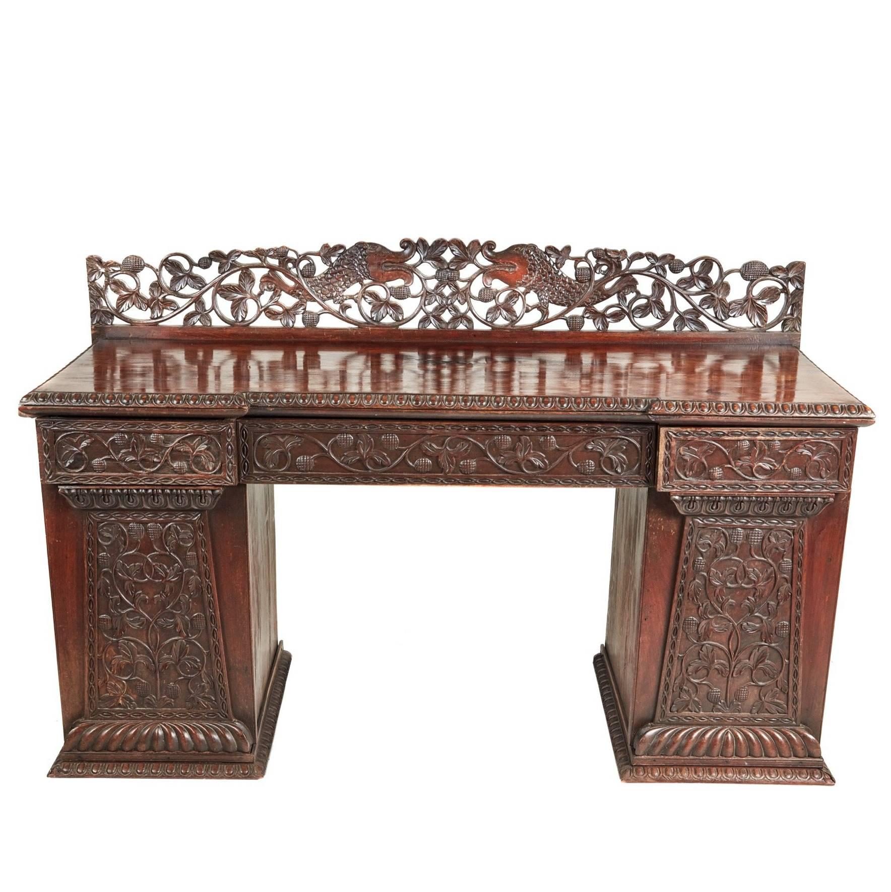 Small Carved Anglo-Indian Padouk Pedestal Sideboard For Sale