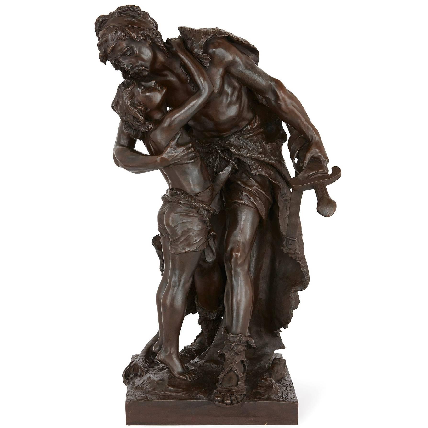 Antique patinated bronze sculpture of a father and son embracing by Henri Plé For Sale