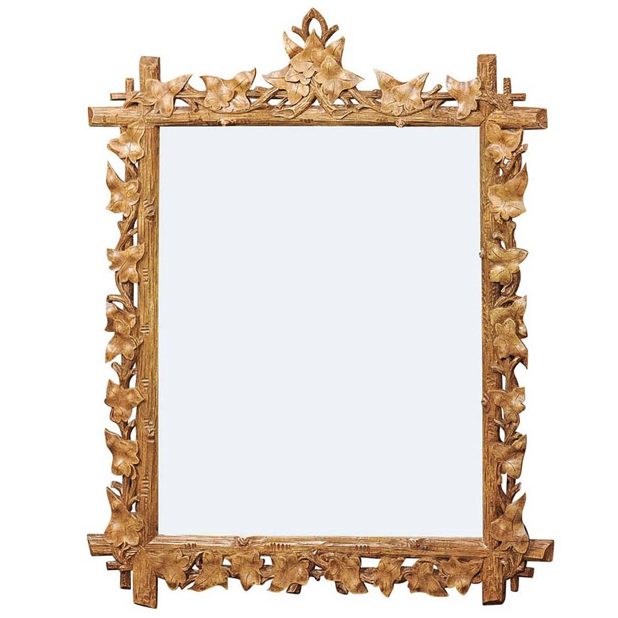 French Mid-20th Century Black Forest Faux-Bois Mirror with Leaf Motifs For Sale