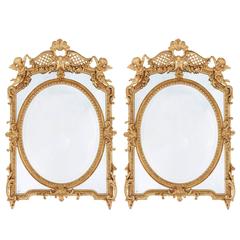 Pair of Antique French Carved Giltwood Mirrors in the Neoclassical Style