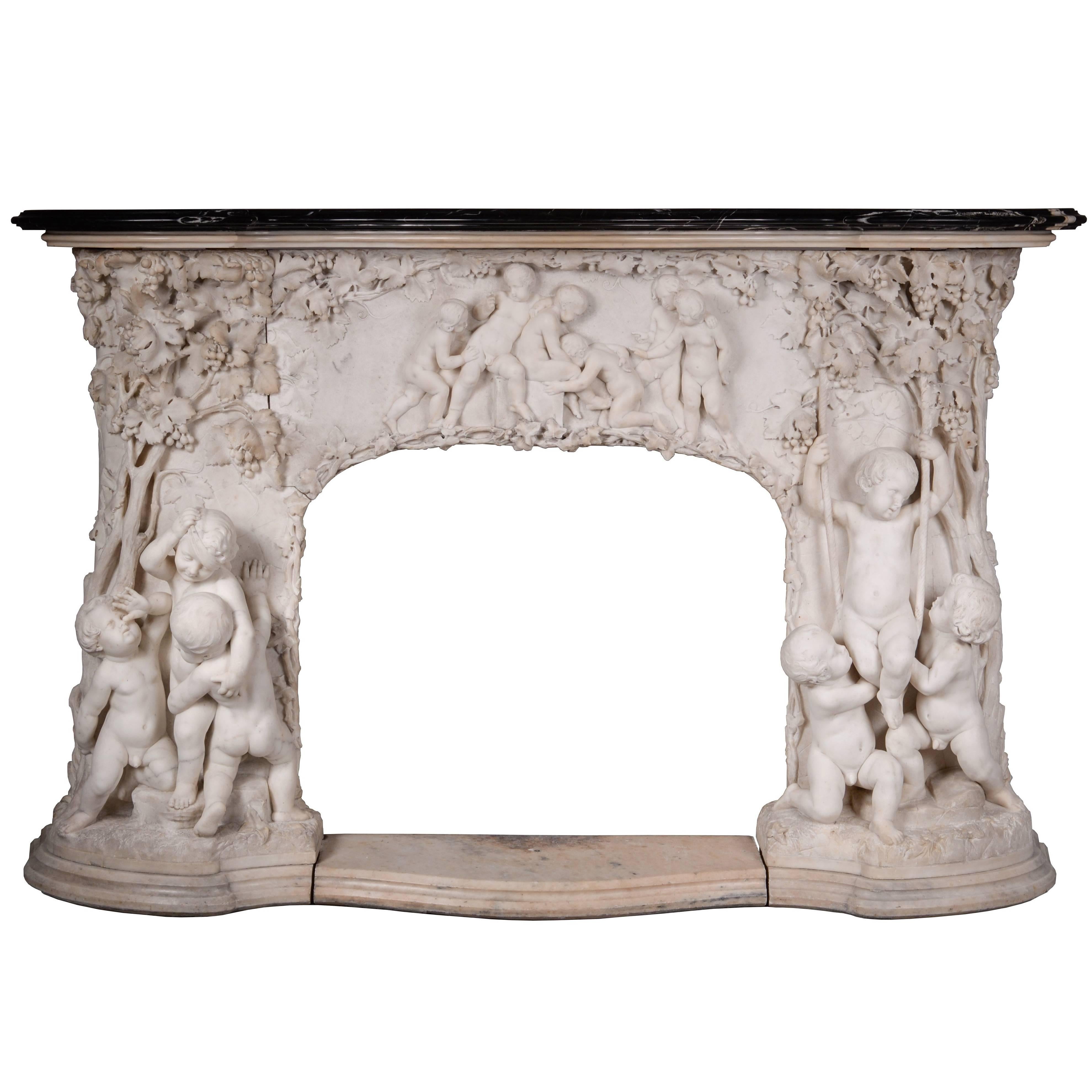 Extraordinary Antique Statuary Marble Fireplace Carved in High Relief with Putti For Sale