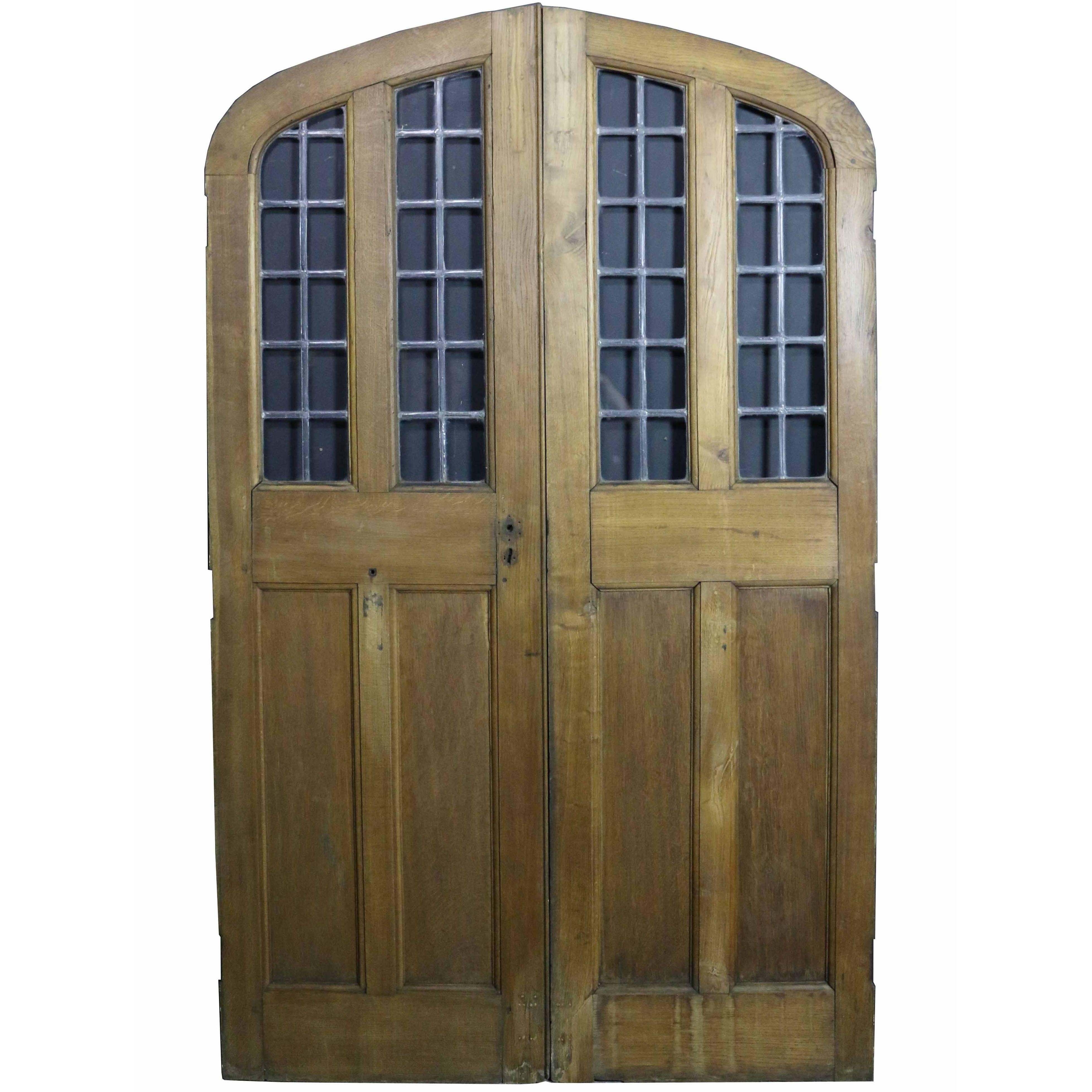 Pair of Arched Oak Double Doors with Leaded Glass Panel, circa 1900