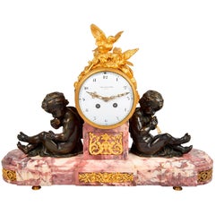 Louis XVI Style Mantel Clock with Doves and Putti Playing Pipes