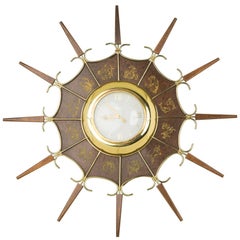 United Embossed Zodiac Sunburst Clock, circa 1950