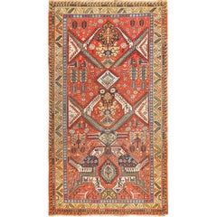 Antique Red Background Soumak Caucasian Rug. Size: 5 ft 9 in x 10 ft 2 in 