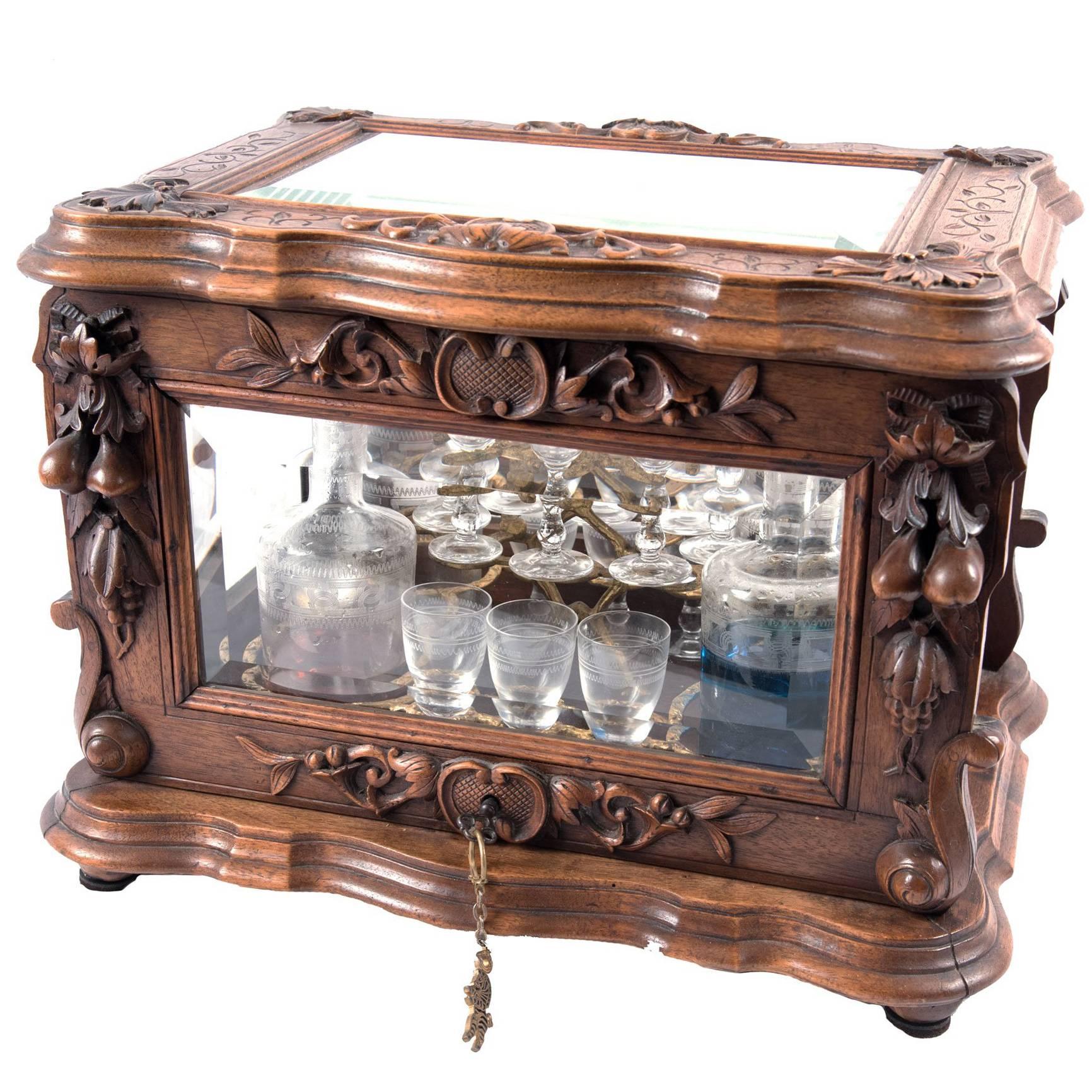 19th Century Carved Walnut Tantalus