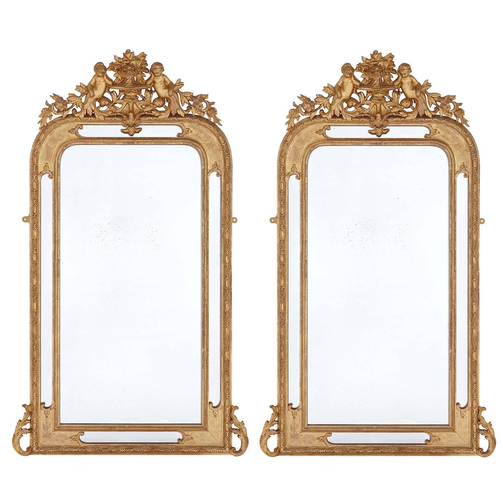 Pair of French Antique Carved Giltwood Mirrors in the Neoclassical Style