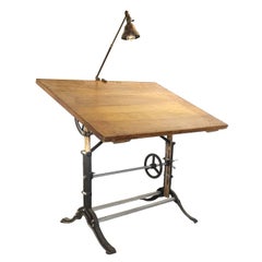 Quintessential Creative Directors Table and Brass Faries Telescoping Lamp