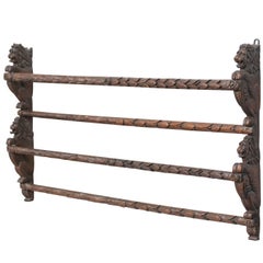 English Oak Rack with Carved Lions Guards from the Late 19th Century