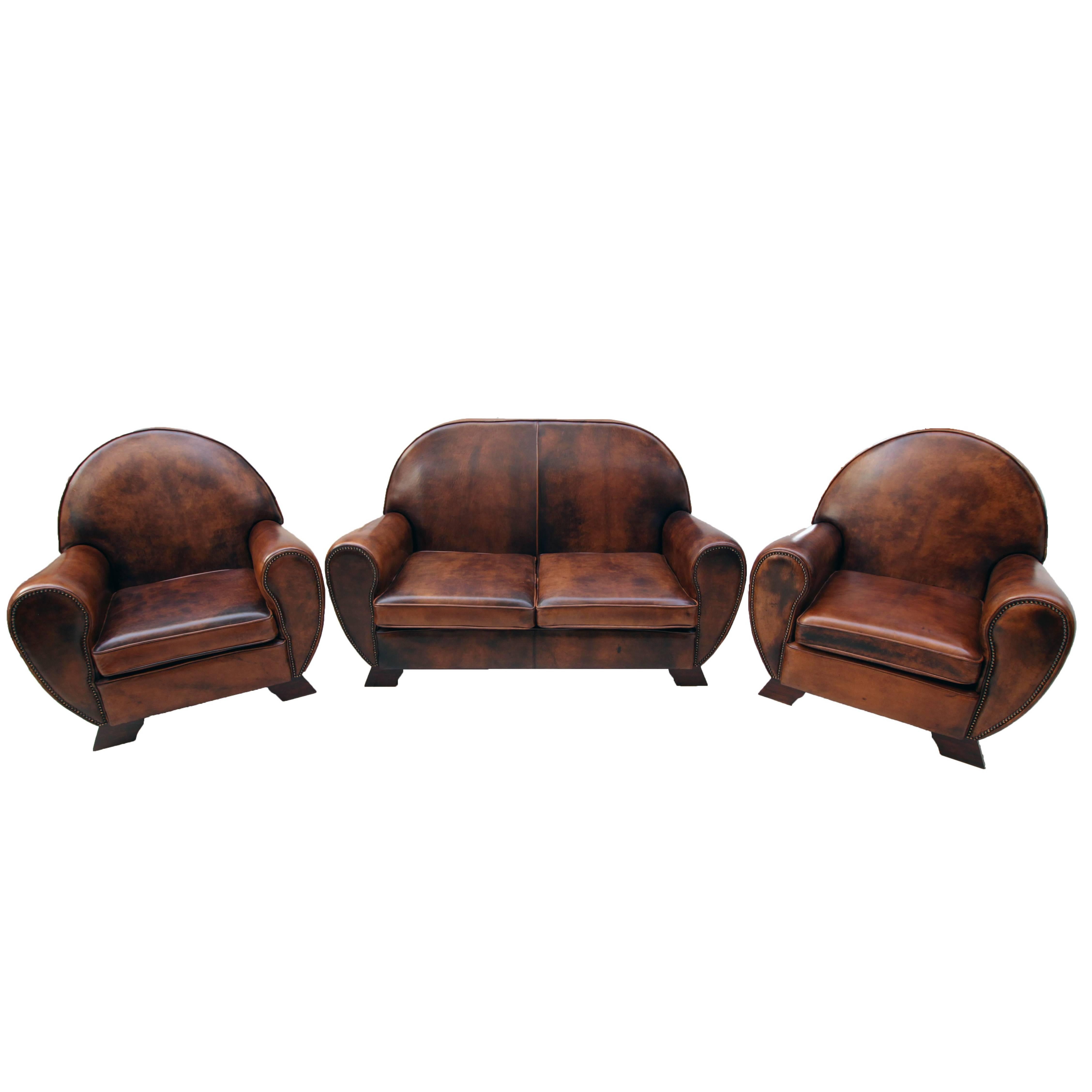 Ensemble de trois fauteuils club Art Déco vintage en cuir brun-cognac