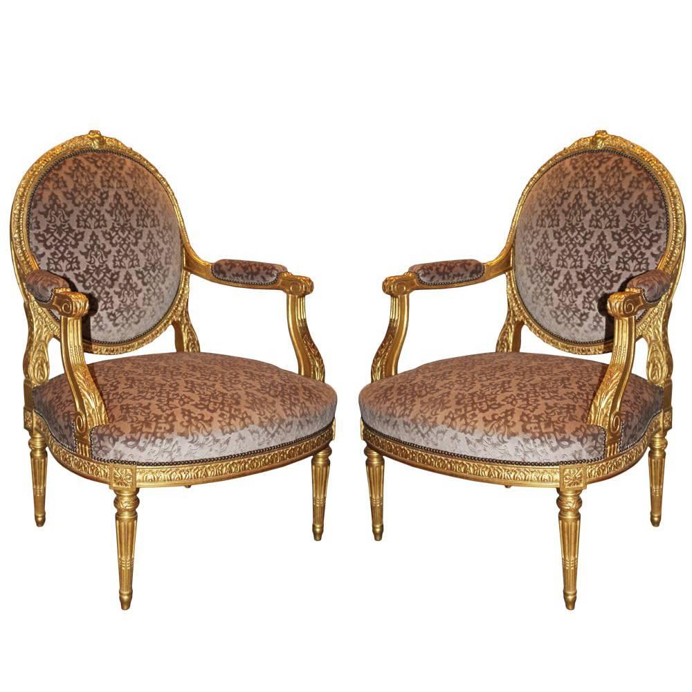 Pair of Late 18th Century Italian Louis XVI Giltwood Marquise Armchairs For Sale