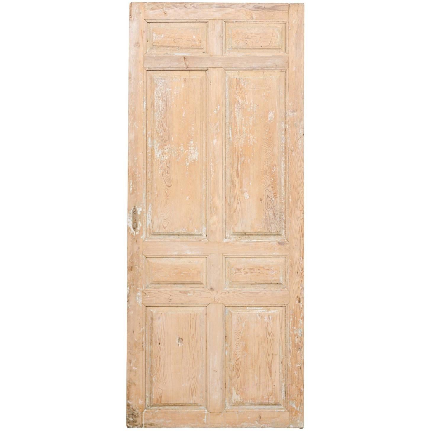 Single French 19th Century, Eight-Panel Door with Natural Pale Wood Finish