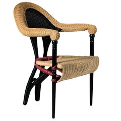 "Liba" Rattan Covered Natural Cane Armchair Designed by Borek Sipek for Driade