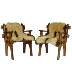 Pair of 1960s Scandinavian Teak Armchairs with Sheepskin