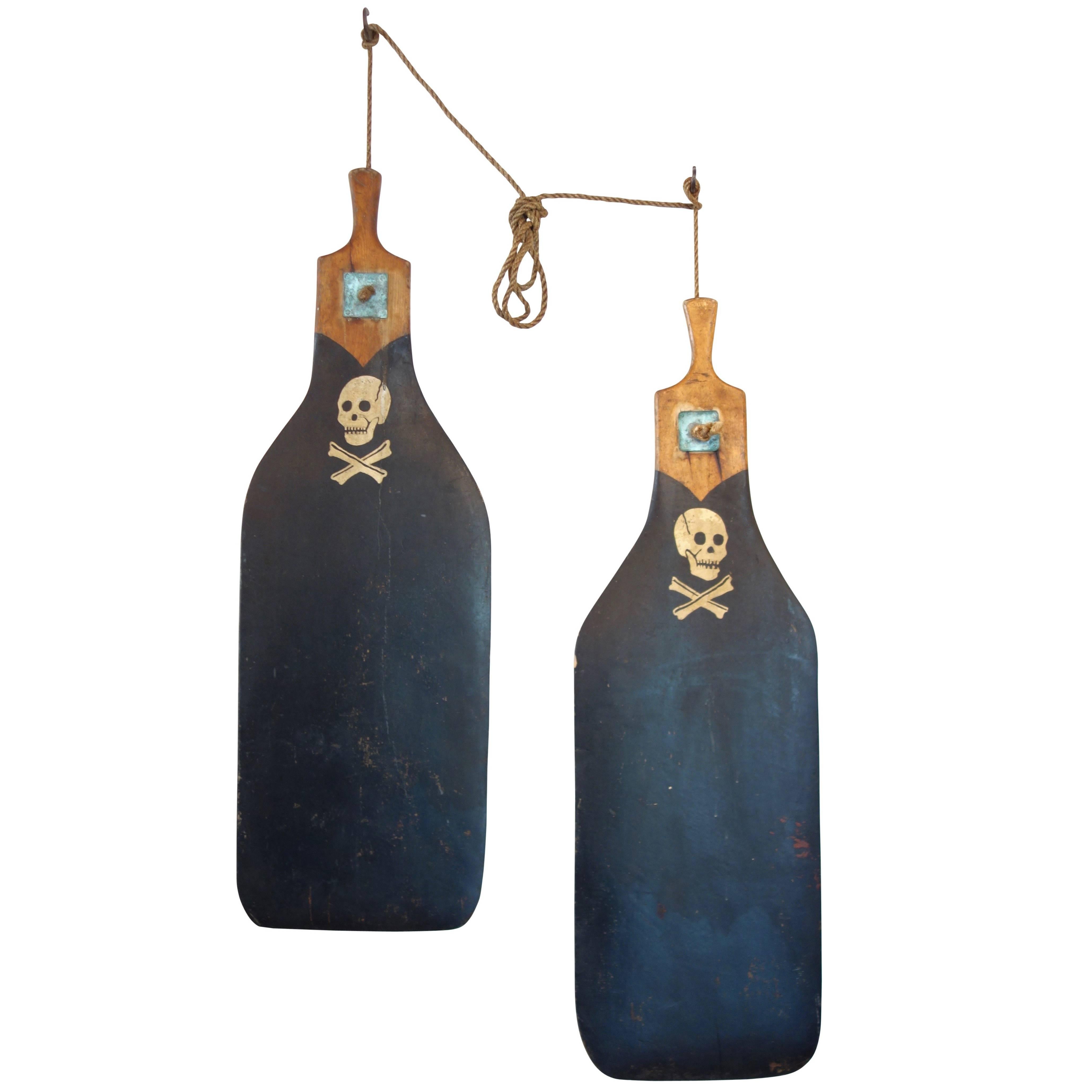 Pair of Boat Rudders with Hand-Painted Skull and Crossbones, circa 1930