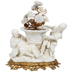 French Chinoiserie Ormolu Bronze & Blanc De Chine Porcelain Group of Chinese Boy