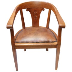 Early 20th Century Art Deco oak wood Armchair with sheep leather seat pad