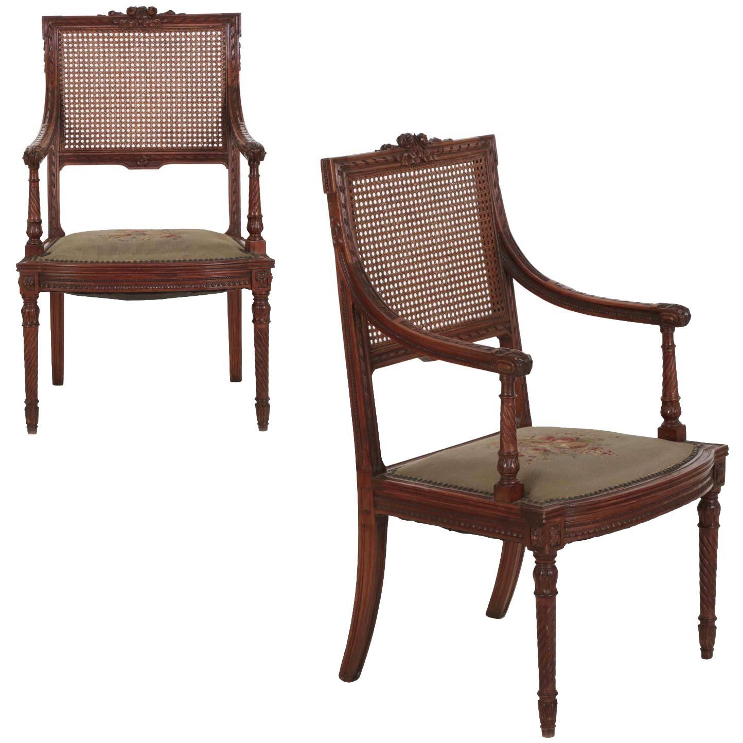 Pair of French, Louis XVI Style Carved Walnut Antique Armchairs, circa 1890