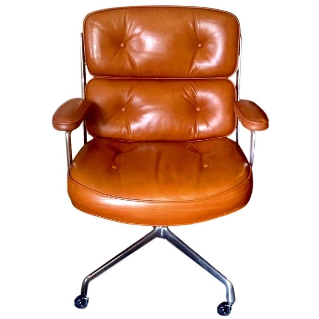 Great vintage leather office chair from the time life building in New York. Original cognac leather in very good vintage condition. Gorgeous patina to leather. Chair swivels, reclines and is height adjustable. New casters. Original aluminium frame