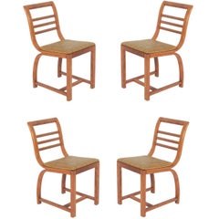 Set of Four Curvaceous Art Deco Dining Chairs by Gilbert Rohde