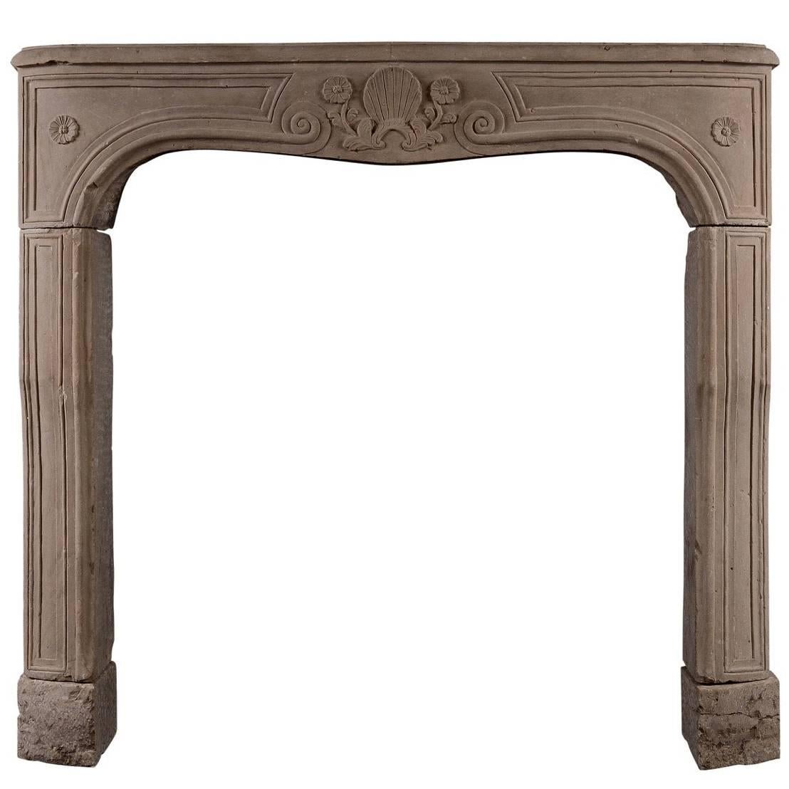 Carved Louis XV Limestone Fireplace For Sale