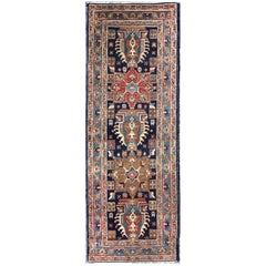Antique Persian Heriz Runner with Geometric Medallions in Red, Blue, and Olive