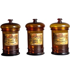 Antique Three Balloon Lid Glass Apothecary Jars with Original Illustrative Labels