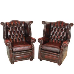 Vintage Set of Two English Chesterfield Wingback Oxblood Leather Chairs, circa 1930