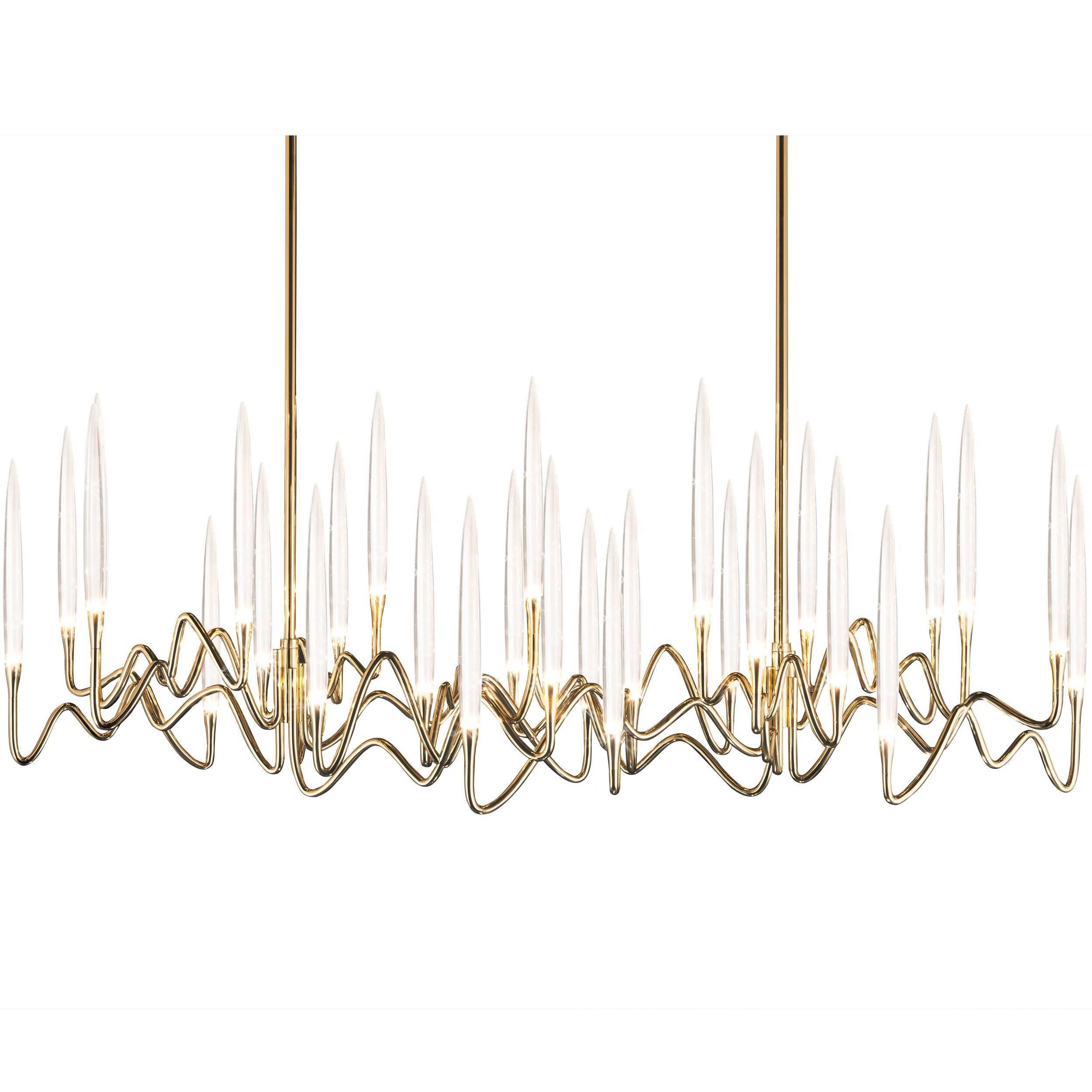 "Il Pezzo 3 Long Chandelier" with a hand forged gold brass structure and crystal